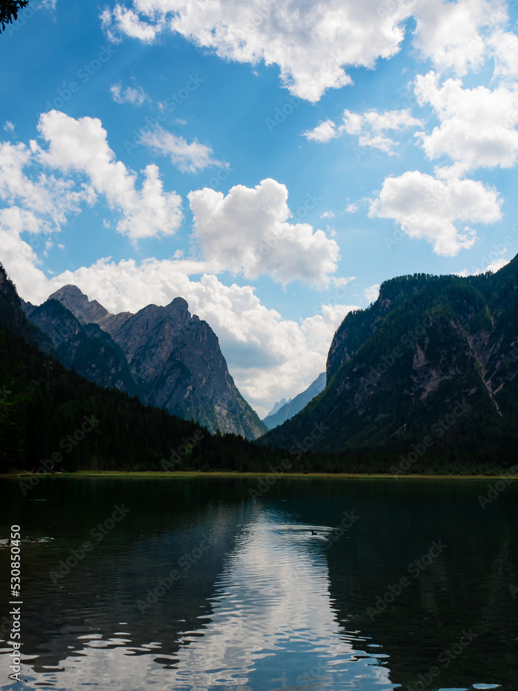 reflections in an italian lake in the alps reflections in an italian lake in the alps