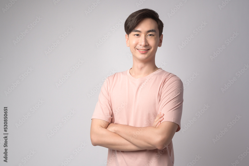 Portrait of young asian man over white background studio. Portrait of young asian man over white background studio.