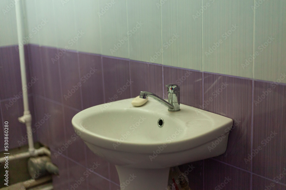 Sink in bathroom. Hand washbasin. Restroom in house. Sink in bathroom. Hand washbasin. Restroom in house.