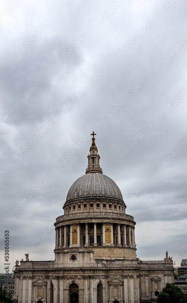 View of Saint Paul Cathedral's dome on a cloudy summer afternoon, London, England