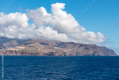 Panoramic view from the ferry on the port of San Sebastian de La Gomera, La Gomera and Tenerife, Canary Islands, Spain, Europe. Spring and summer. View on the beach and the hills in the backcountry © Chris