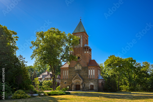 Nordfassade mit dem Hauptportal der mächtigen St. Antonius-Basilika in Eichwalde photo