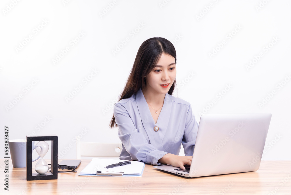 Business women who sit at their desks Business women who sit at their desks