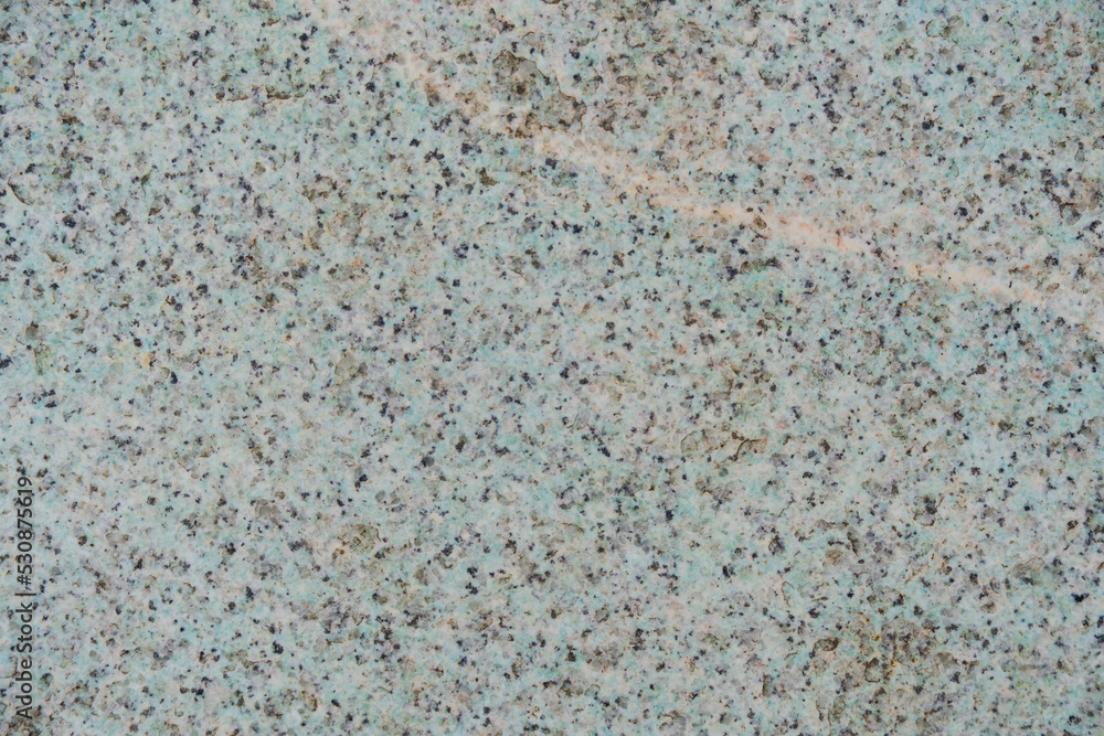 Texture and background granite stone greenish color. Texture and background granite stone greenish color.