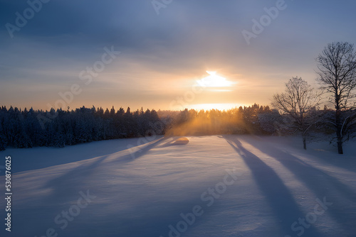 Sunrise in a snowy winter landscape.  © ECrafts