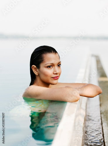 Woman bathing in a Pool at Hotel, Dambulla, Sri Lanka.  