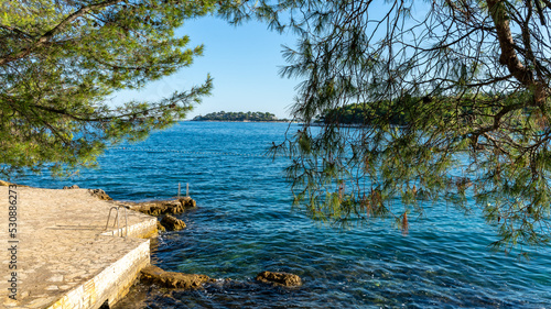 Fototapeta Naklejka Na Ścianę i Meble -  A sunny summer day at the Plava Laguna in Porec, Croatia