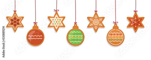 christmas card with hanging gingerbread cookies decoration on blue background