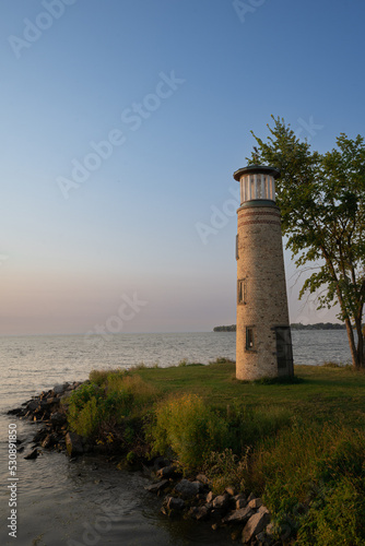 Small lighthouse on lake shore