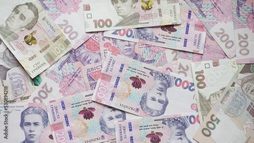 Ukrainian paper money in denominations of one hundred, two hundred, five hundred hryvnias