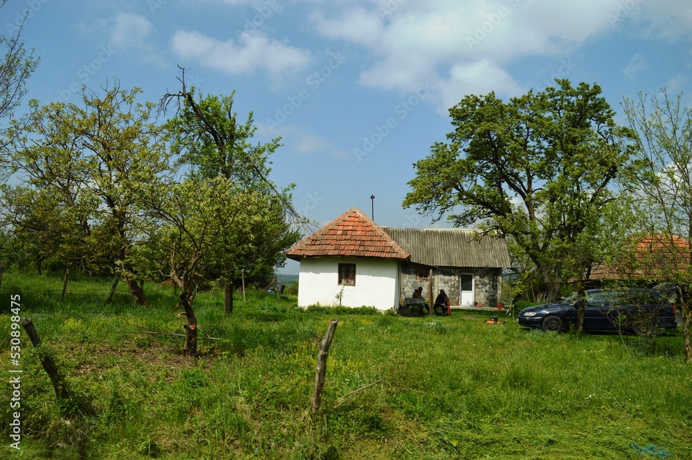an old little white house in the village