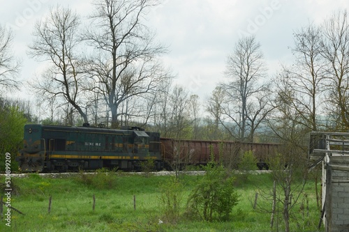 a large freight train on the plain