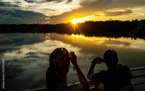 sunset on the river at Amazonia, Roraima, Brazil