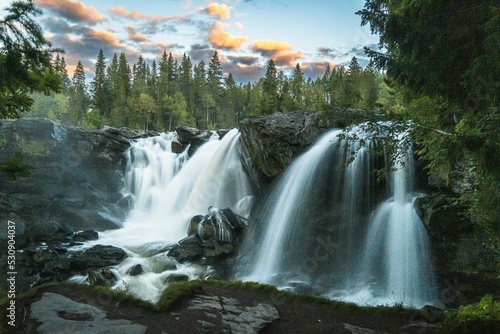 Long exposure of the Ristafallet waterfall in Sweden. photo