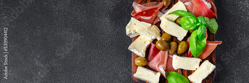 cheese platter meat plate jamon, cheese, olive meal food snack on the table copy space food background