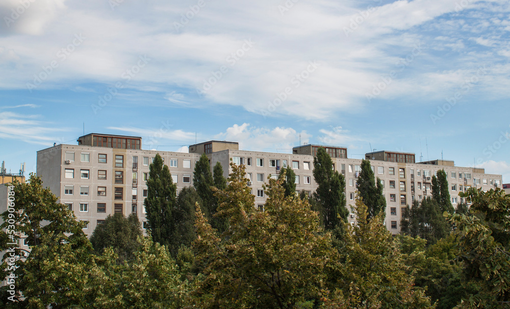 Concrete block of flats and cloudy sky in the Gazdagrét neighborhood of Budapest, Hungary, Europe. Residential area consisting of prefabricated buildings in the western part of the 11th district.