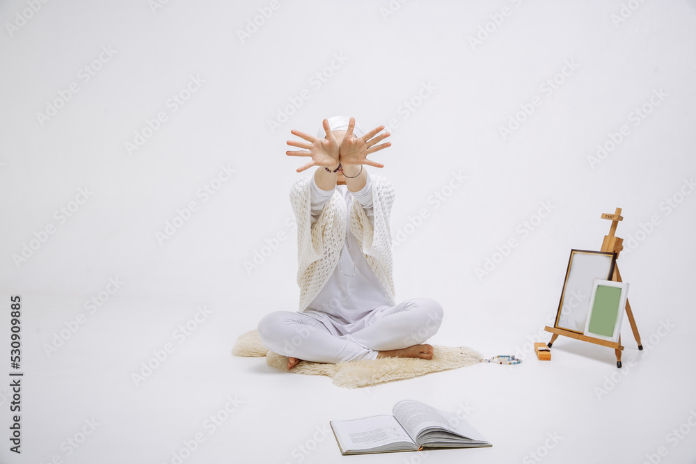 beautiful girl doing yoga in light clothes in white yoga studio beautiful girl doing yoga in light clothes in white yoga studio