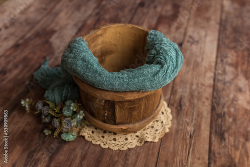 Basket with a background for a photo session of a baby.Basket for a newborn.