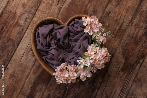Basket with a background for a photo session of a baby.Basket for a newborn.
