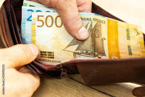 Принти на полотні Content of Norwegian wallets, Concept of home finances during inflation, Man sho