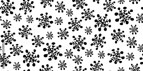 Christmas seamless pattern with silhouettes of snowflakes in childlike naive scribble style. For greeting card, gift packaging., wrapping paper. Funny scrabble style collection for happy new year. 