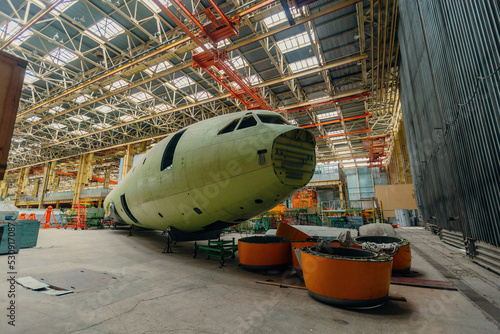 Process of assembling of aircraft in the factory photo