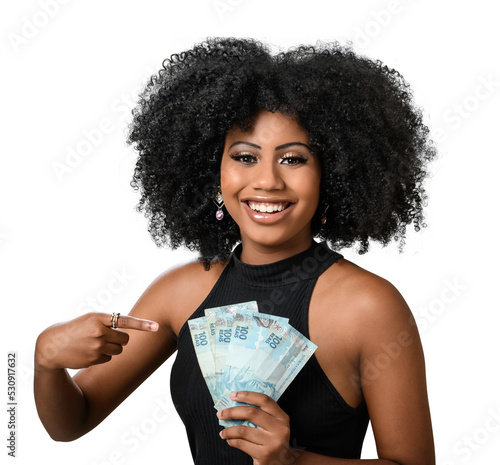 woman holding money, young smiling woman holding Brazilian money photo