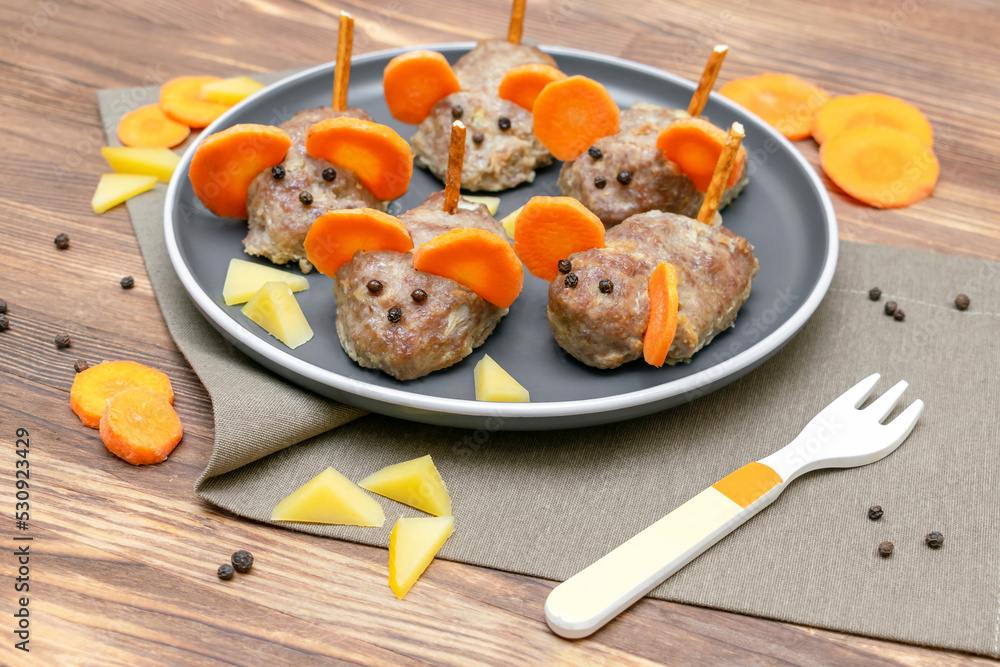 Small meatball mouse, meatloaf mice with ears of carrot, cheese on plate, creative and fun food snack idea for kids party. Menu for spooky Halloween dessert treats, edible cute rat selective focus Small meatball mouse, meatloaf mice with ears of carrot, cheese on plate, creative and fun food snack idea for kids party. Menu for spooky Halloween dessert treats, edible cute rat selective focus
