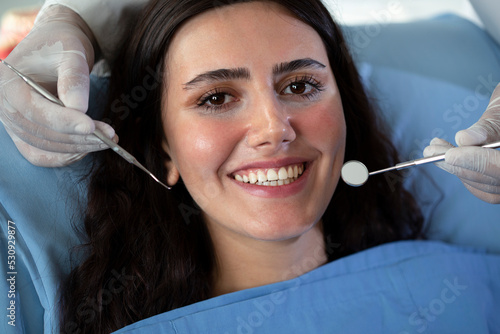 young beautiful woman at dental clinic