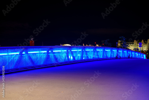 Canvas Print Night photo of a blue neon bridge with cracked glass Oslo Norway