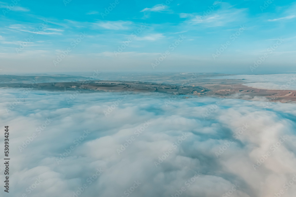 Top view of fog and high way, aerial photos of road and fog with sunset light and clouds