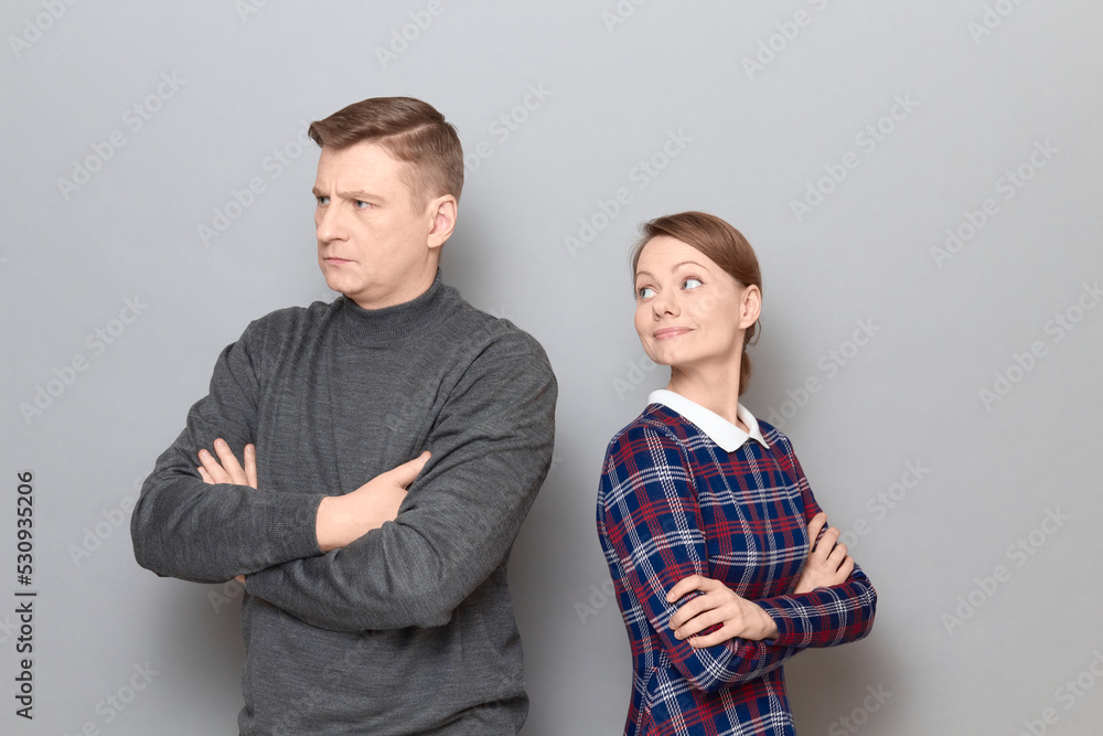 Studio portrait of adult couple during conversation Studio portrait of adult couple during conversation
