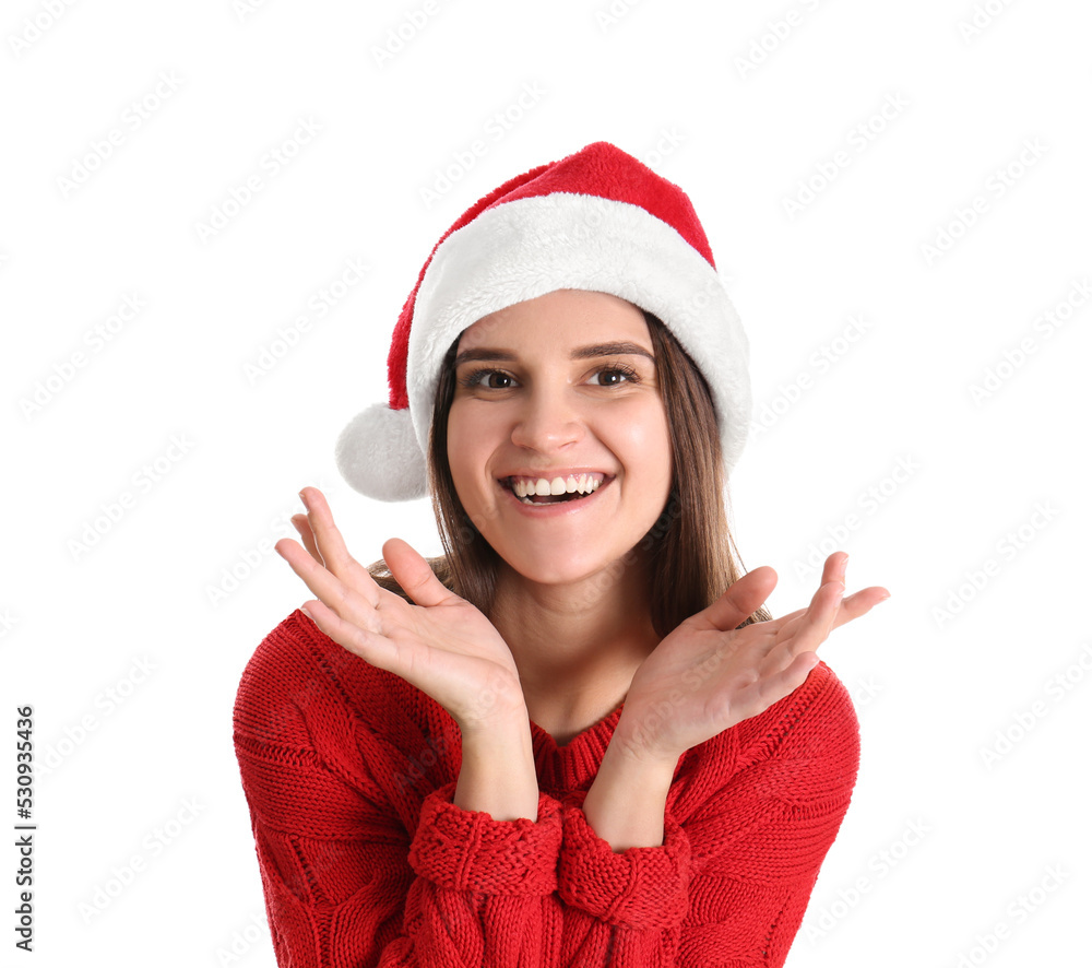 Pretty woman in Santa hat and red sweater on white background Pretty woman in Santa hat and red sweater on white background