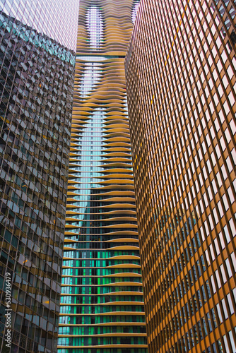 Three convergent skyscrapers facades with innovative architectonic design.