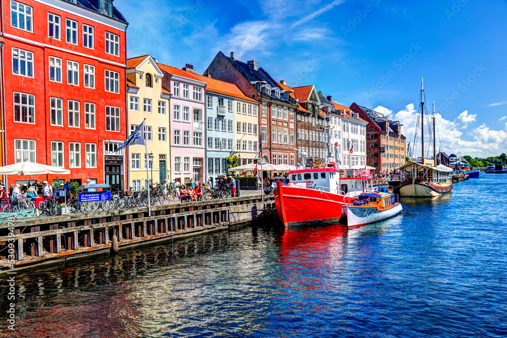 Copenhagen, Denmark - July 10, 2018: The colourful boats and buildings of the Nyhavn district of Copenhagen
