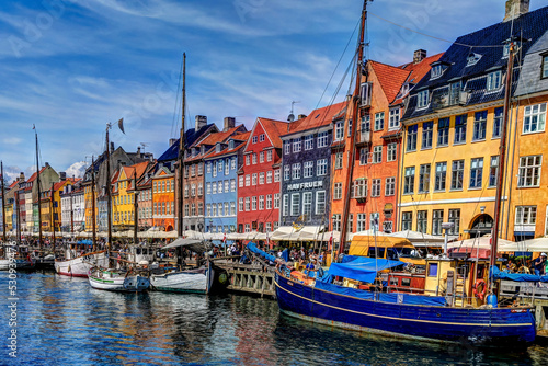 Copenhagen, Denmark - July 10, 2018: The colourful boats and buildings of the Nyhavn district of Copenhagen 