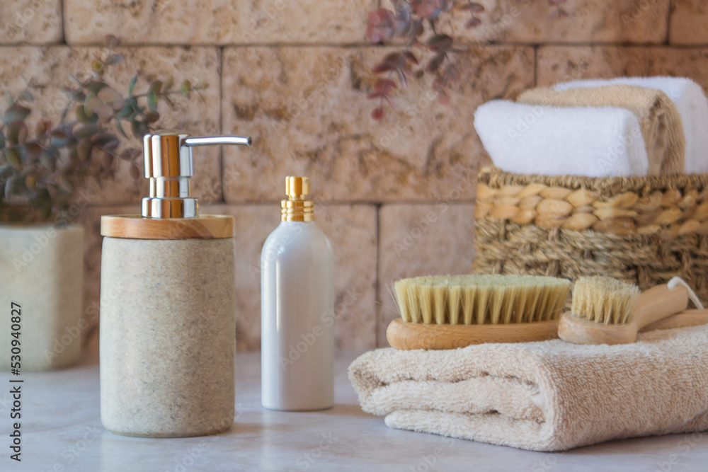 Brushes for dry lymphatic drainage massage on a light towel. Spa accessories. Brushes for dry lymphatic drainage massage on a light towel. Spa accessories.