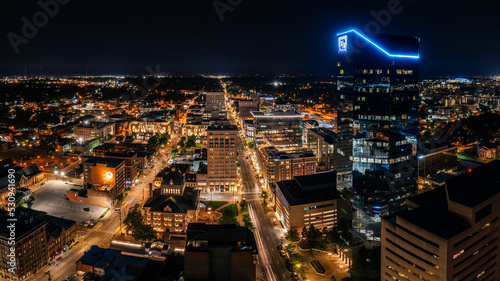 Aerial photograph of the Lexington, Kentucky skyline at night with the city alite. photo