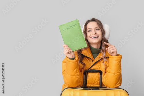 Beautiful female tourist wi...