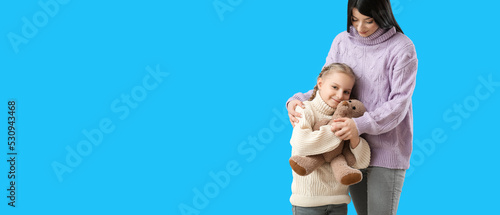 Happy mother and her little...
