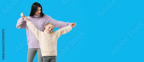 Happy mother and her little...