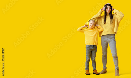 Happy mother and her little...