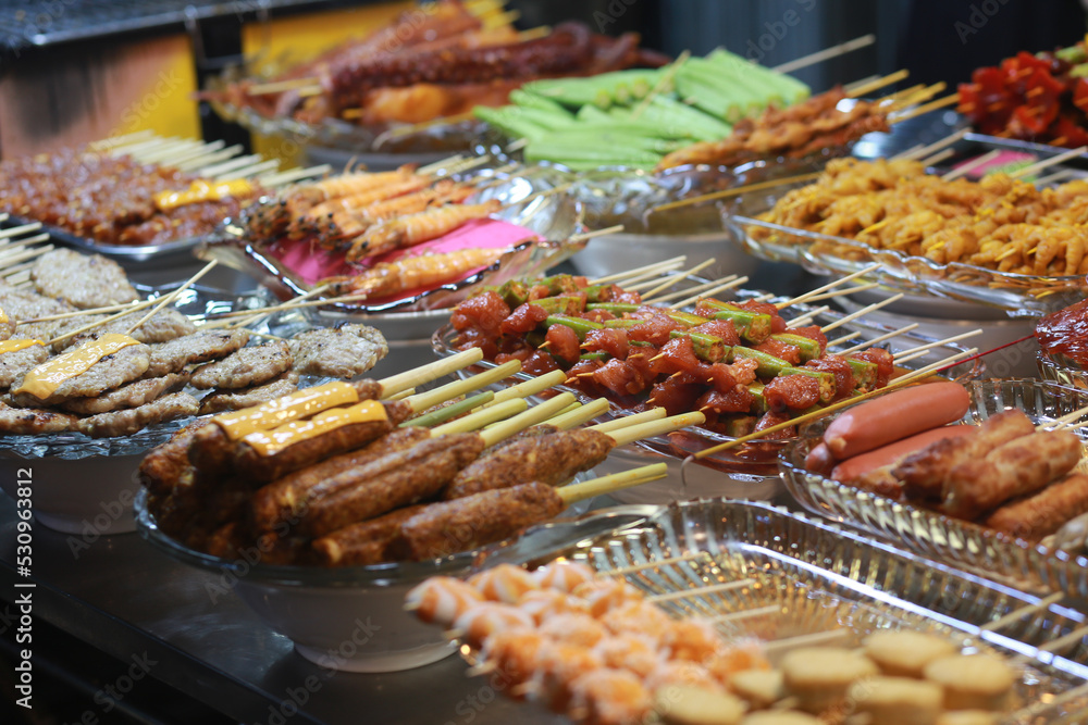 grilled dishes like pork, okra, beef, bell pepper in ho thi ky street food grilled dishes like pork, okra, beef, bell pepper in ho thi ky street food