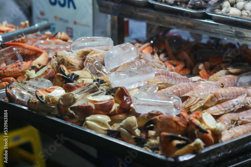 Crab, mantis shrimp, snail, fresh seafood in ho thi ky street, ho chi minh city, vietnam photo