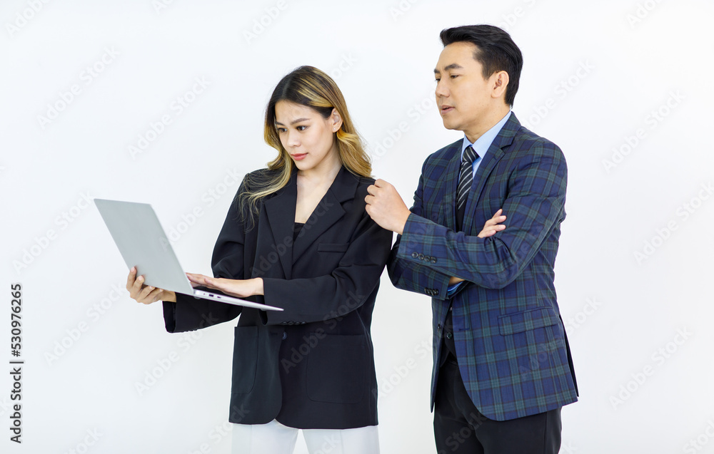 Millennial Asian cheerful successful professional male businessman manager female businesswoman colleague in formal suit standing smiling holding using laptop computer together on white background Millennial Asian cheerful successful professional male businessman manager female businesswoman colleague in formal suit standing smiling holding using laptop computer together on white background