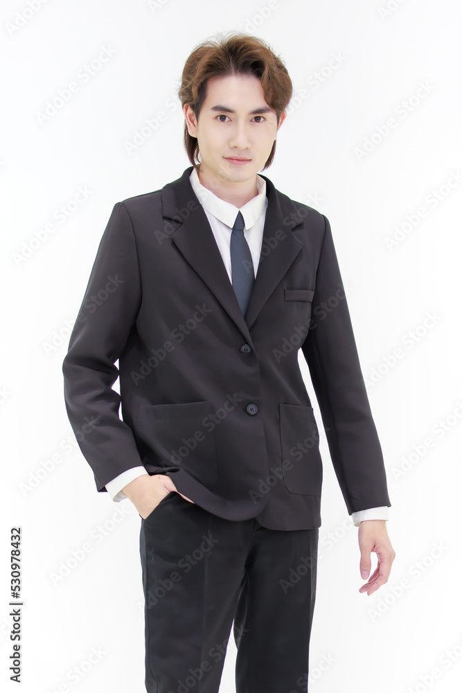 Portrait isolated cutout studio shot of Millennial Asian smart handsome successful professional male businessman in formal suit standing posing smiling put hand in pants pocket on white background Portrait isolated cutout studio shot of Millennial Asian smart handsome successful professional male businessman in formal suit standing posing smiling put hand in pants pocket on white background