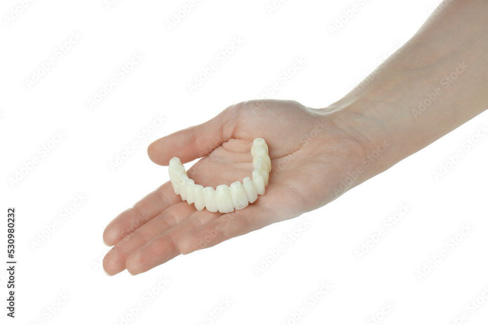 Female hand with decorative teeth, isolated on white background Female hand with decorative teeth, isolated on white background