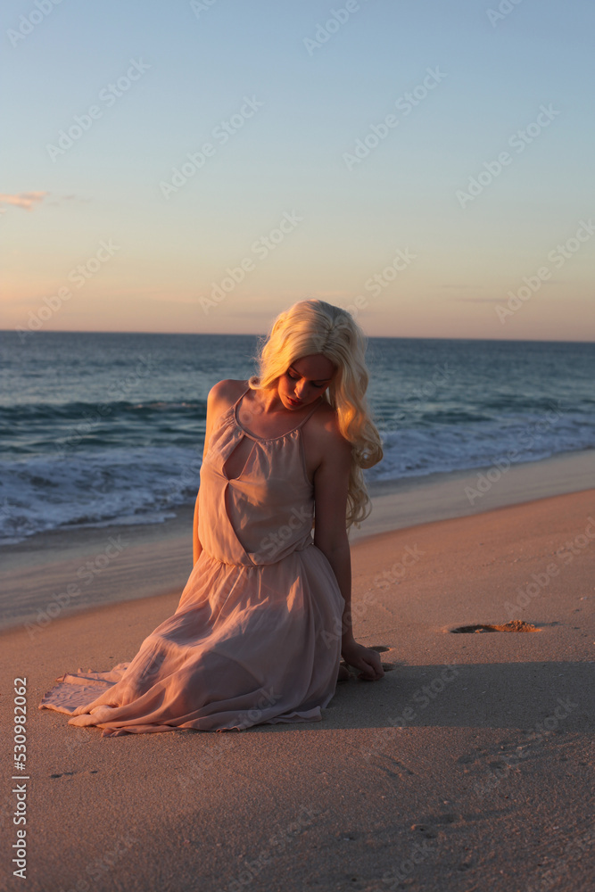 full length portrait of beautiful young woman with long hair wearing ...
