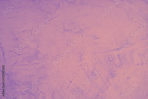 Venetian stucco of purple color. Wall Texture. Violet venetian plaster, abstract modern background. Purple High resolution texture for design. Copy space for design.