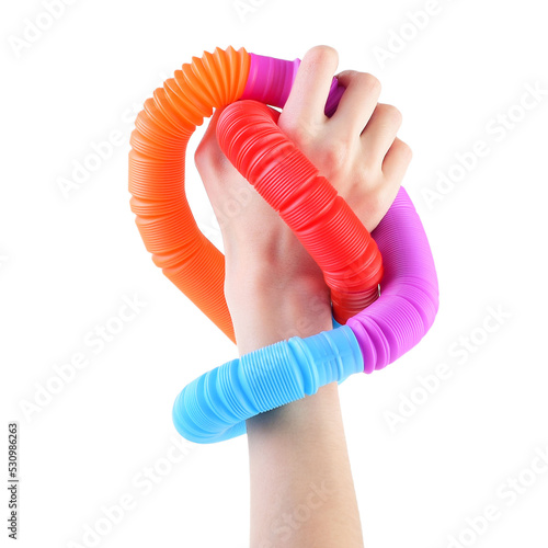 Pop tube isolated on a white background. A popular, sensory antistress toy. Corrugated tube for children. A new trend. Stress relief concept